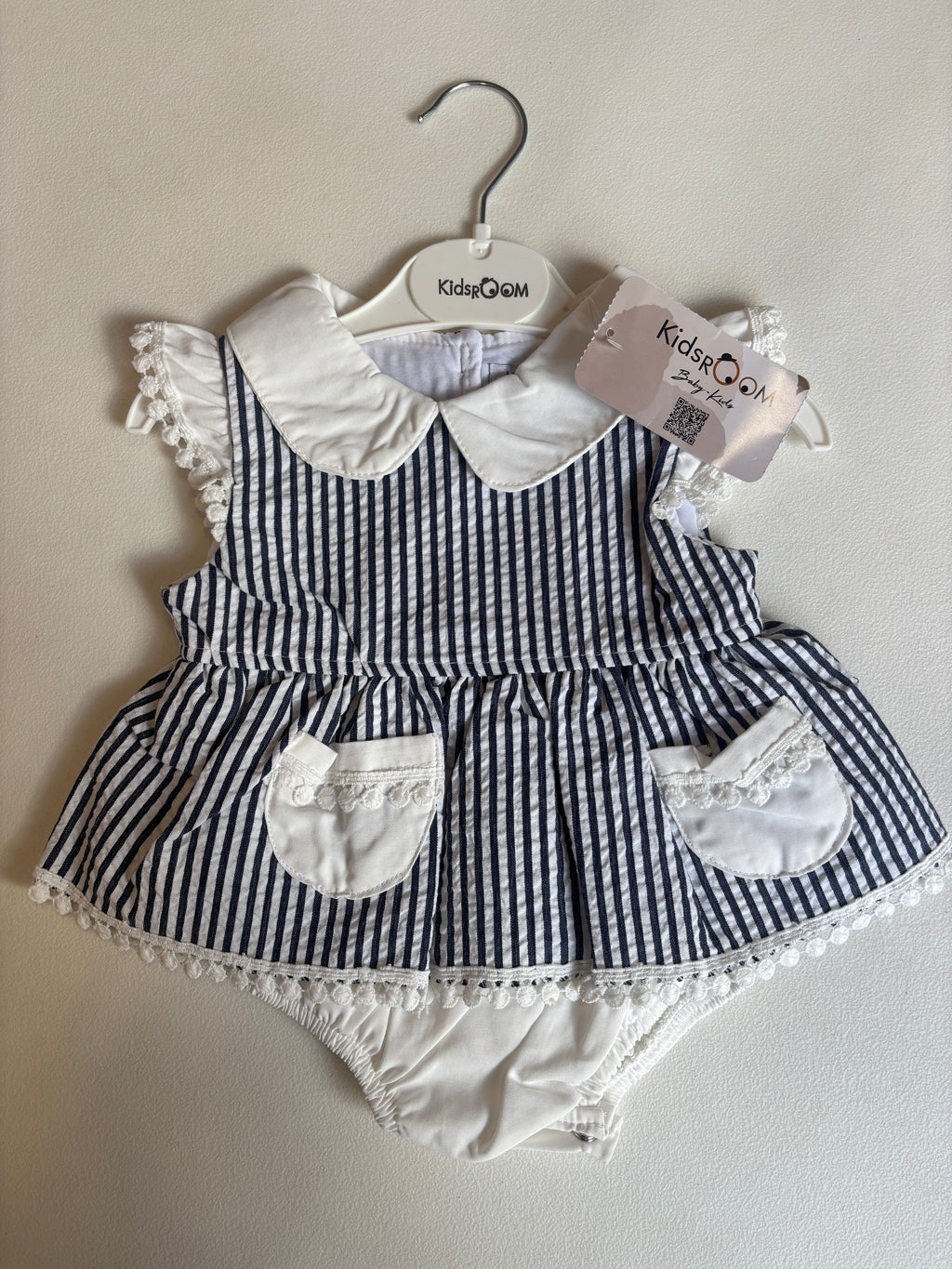 White and Navy Skirted Romper