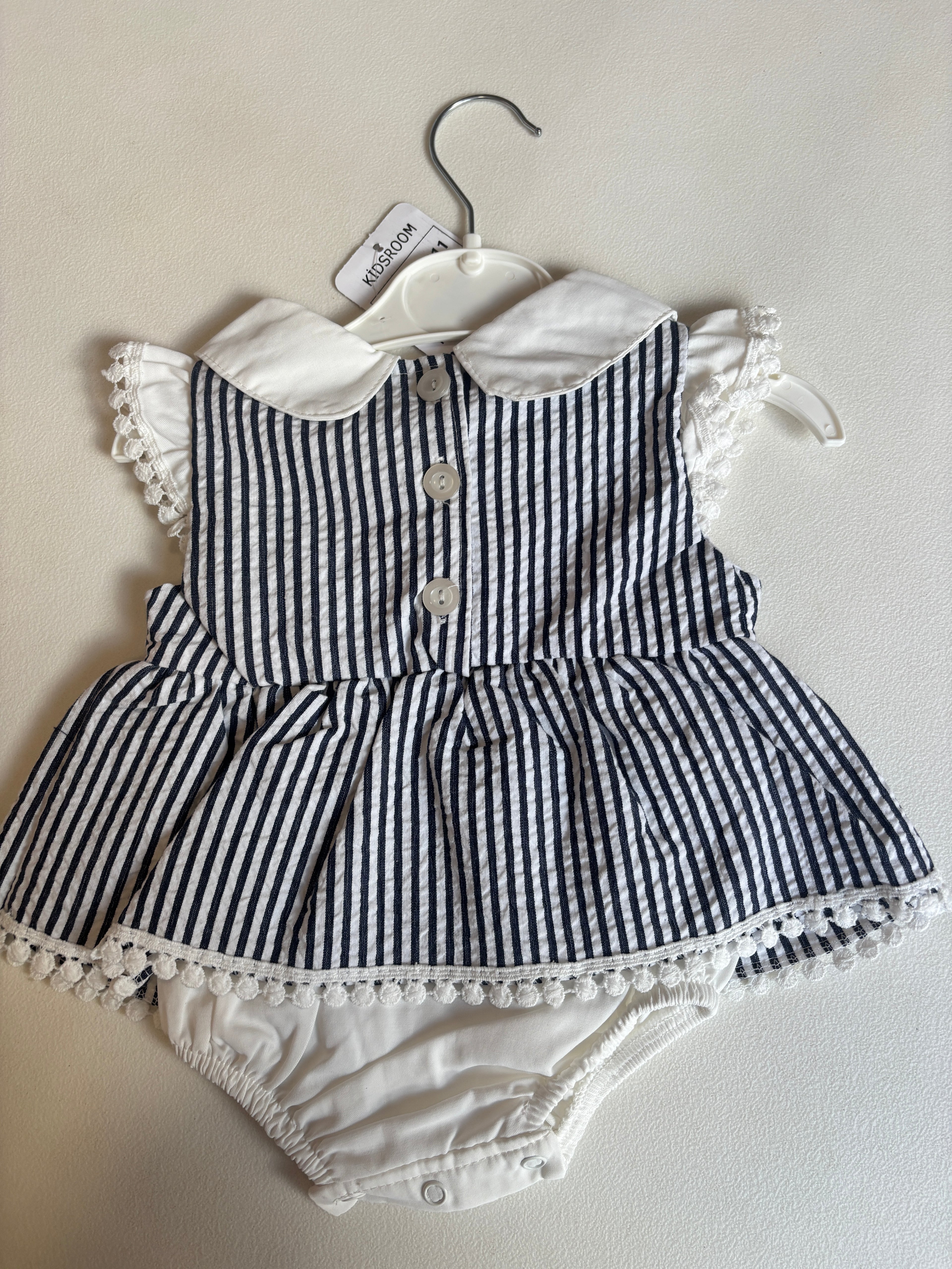 White and Navy Skirted Romper